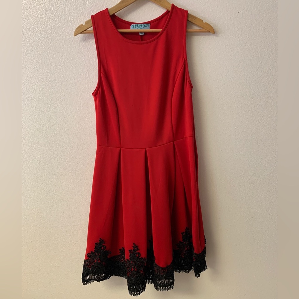 Red holiday dress with black lace trim